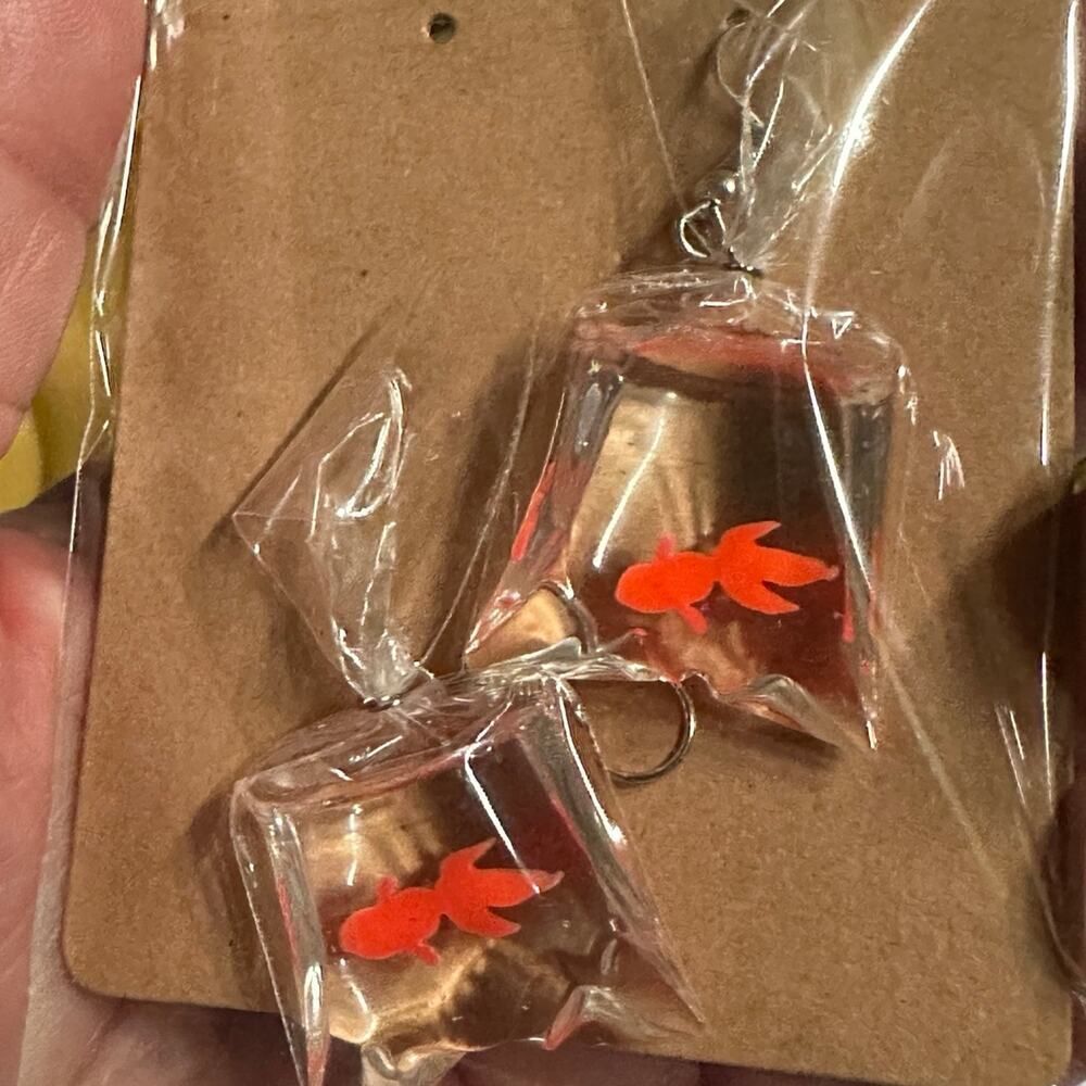 So cute‎ dangling goldfish in a bag -